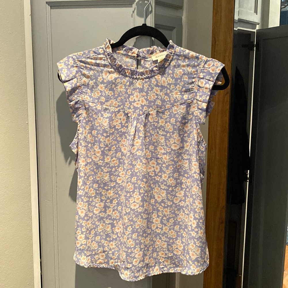 Light blue floral top w/ white peach colored flowers